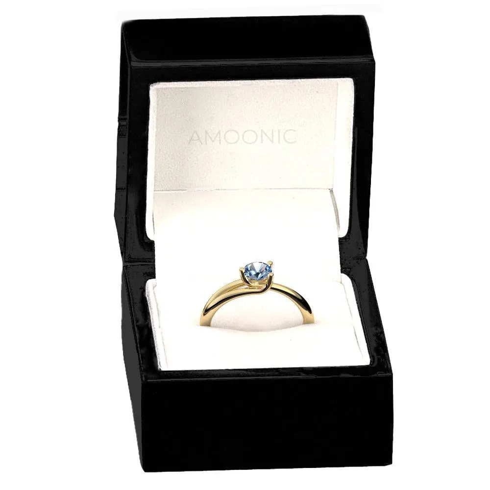 Timeless Elegance - Gelbgold 585 - Blautopas